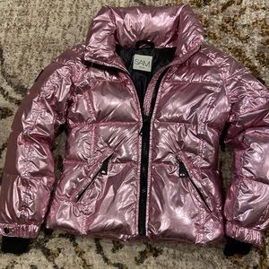 Girls metallic pink puffer jacket.